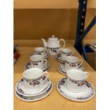 A ROYAL DOULTON 'AUTUMN'S GLORY' PART TEA SET TO INCLUDE TEAPOT, CUPS SAUCERS AND SIDE PLATES