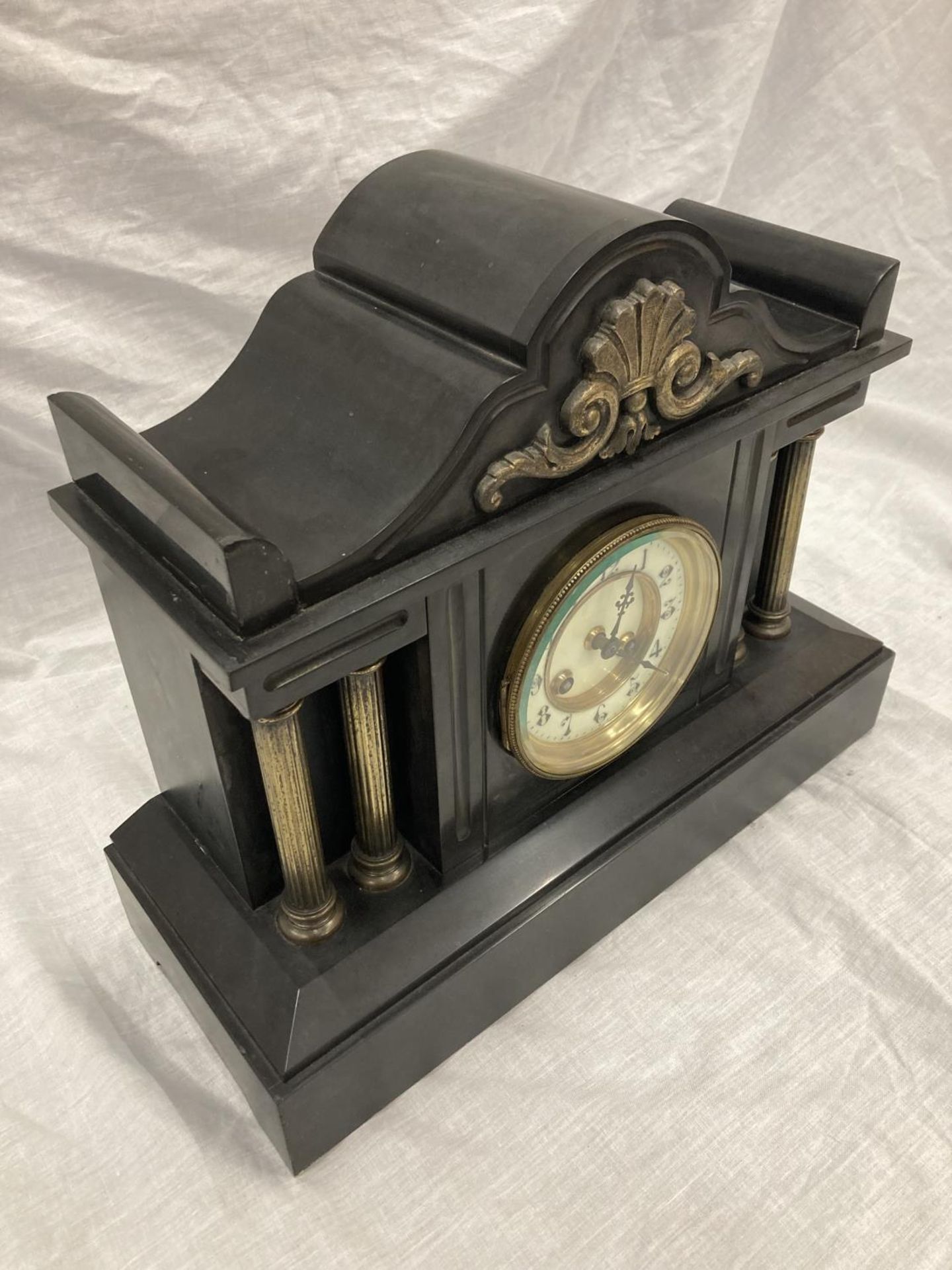A SLATE VICTORIAN MANTLE CLOCK WITH ENAMELLED FACE, COLUMN DECORATION AND PENDULUM. WIDTH 38CM, - Image 2 of 8