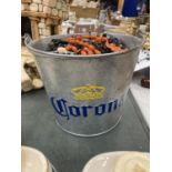 A 'CORONA' BEER BUCKET CONTAINING A QUANTITY OF COSTUME JEWELLERY - NECKLACES, BANGLES, BEADS, ETC