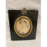 A GEORGIAN PERIOD WATERCOLOUR PORTRAIT MINIATURE OF A LADY. DATED TO REVERSE 1743. APPROX 10.5CM X
