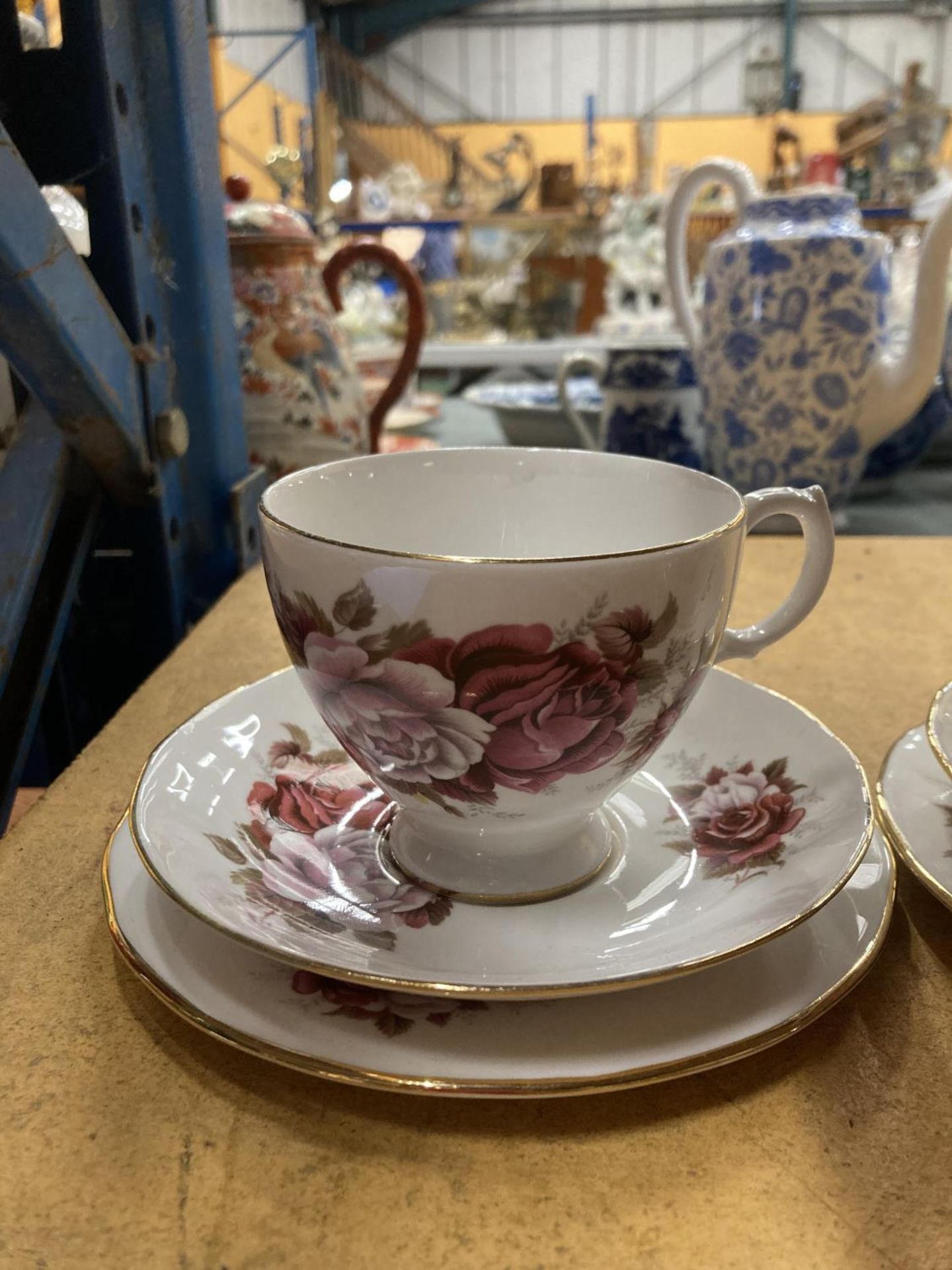 A QUANTITY OF BONE CHINA 'ROSE' PATTERNED TRIOS PLUS A COALPORT 'JUNETIME' CUP AND SAUCER AND A - Image 6 of 8