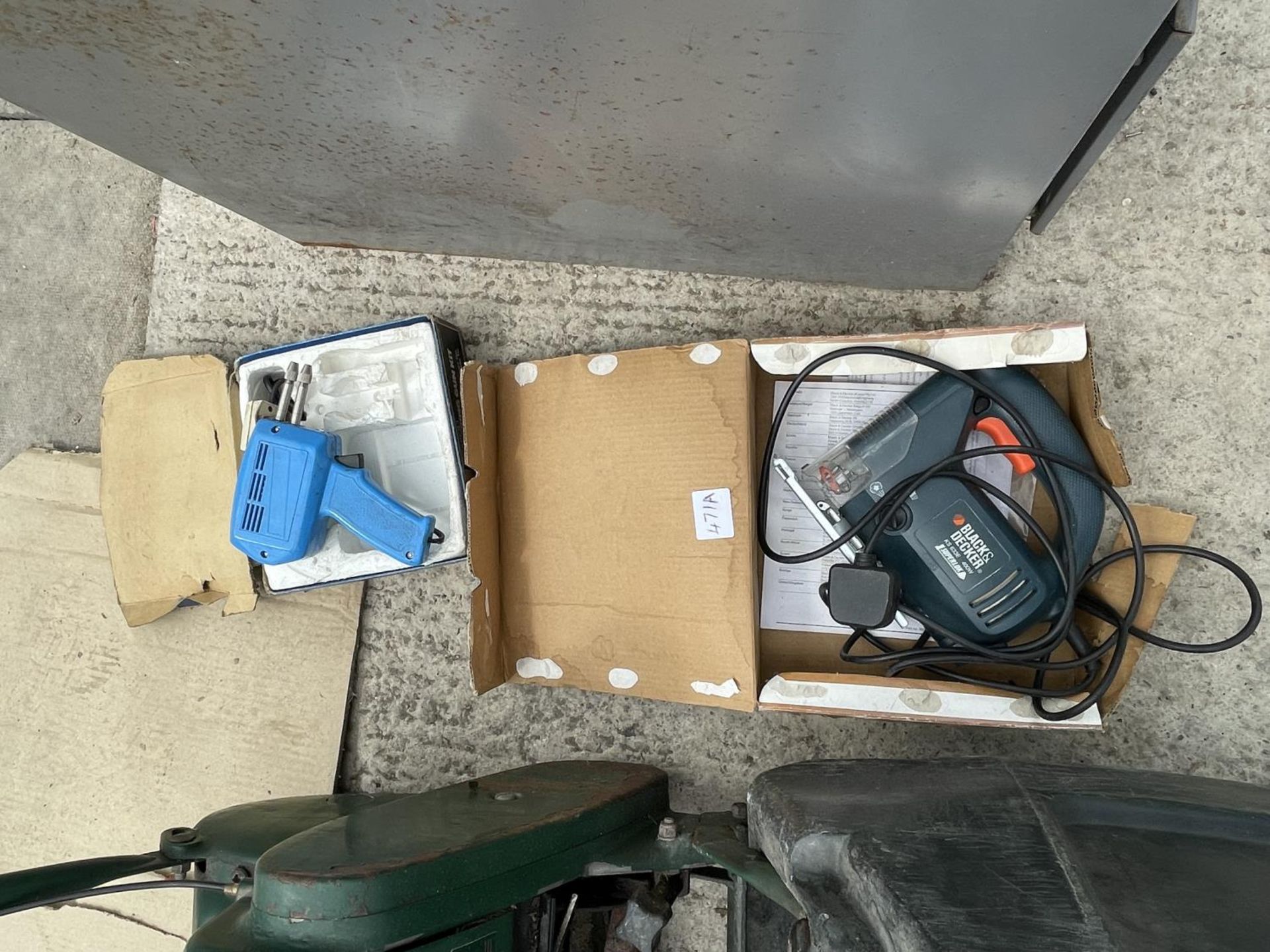 A JIGSAW AND A DRAPER SOLDERING GUN IN BOXES