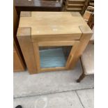 A MODERN OAK TV/HI-FI CABINET WITH GLASS DOOR AND INTERNAL GLASS SHELVES, 29.5" WIDE