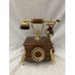 A VINTAGE STYLE OAK TELEPHONE WITH BRASS DETAILING