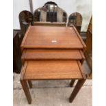 A NEST OF THREE RETRO TEAK TABLES