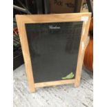 A 'GORDON'S' GIN BLACKBOARD ON A STAND 39CM X 56CM