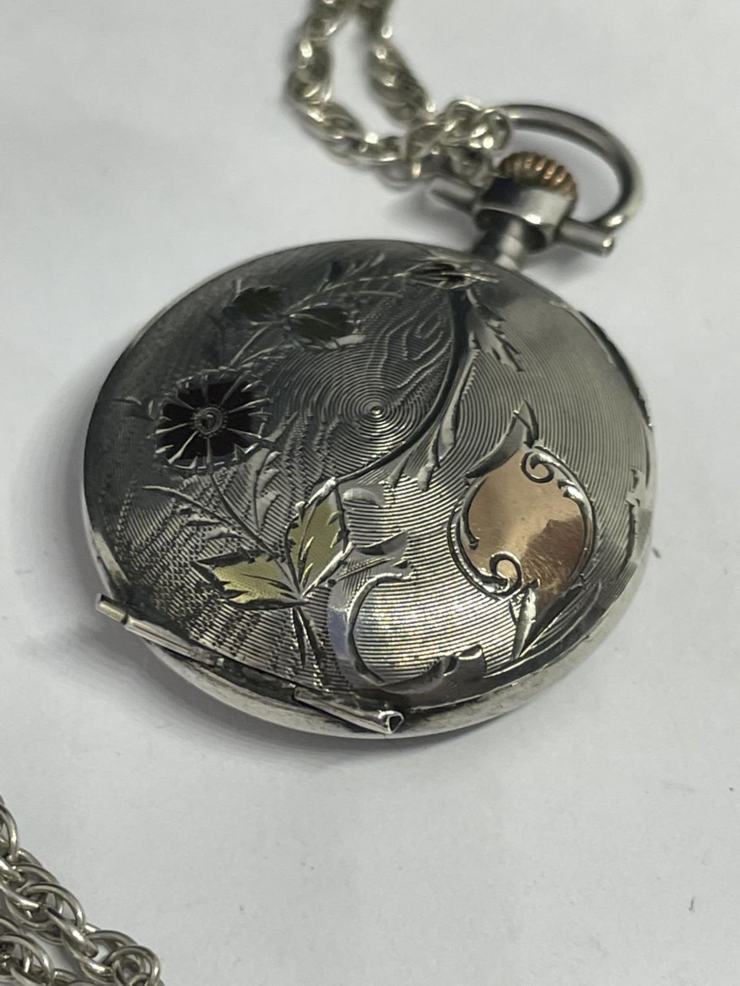 A DECORATIVE FOB WATCH ON A MARKED SILVER CHAIN - Image 3 of 3