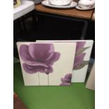 TWO CANVAS WALL HANGINGS WITH FLORAL DECORATION
