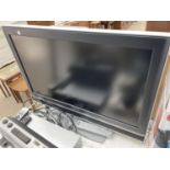 A SONY 32" TELEVISION WITH REMOTE CONTROL, A PANASONIC DVD PLAYER AND A MURPHY RADIO