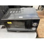 A BLACK SIGNATURE MICROWAVE OVEN