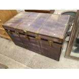 A 'ATLAS' TRAVELLING TRUNK WITH BRASS FITTINGS, PSEUDO WOODEN EFFECT INTERNALLY AND LIFT-OUT TRAY,