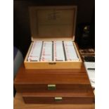 A QUANTITY OF VINTAGE FAMILY SLIDES CASED IN FIVE WOODEN BOXES