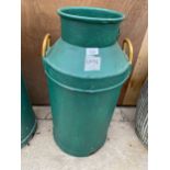 A VINTAGE GREEN PAINTED CAST IRON MILK CHURN (A/F TO BASE)