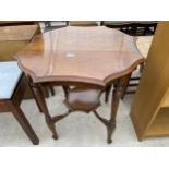 A VICTORIAN WALNUT TWO TIER CENTRE TABLE ON TURNED AND FLUTED SUPPORTS, 29" DIAMETER