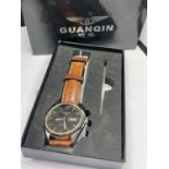 A BOXED GUANQIN WRIST WATCH SEEN WORKING BUT NO WARRANTY