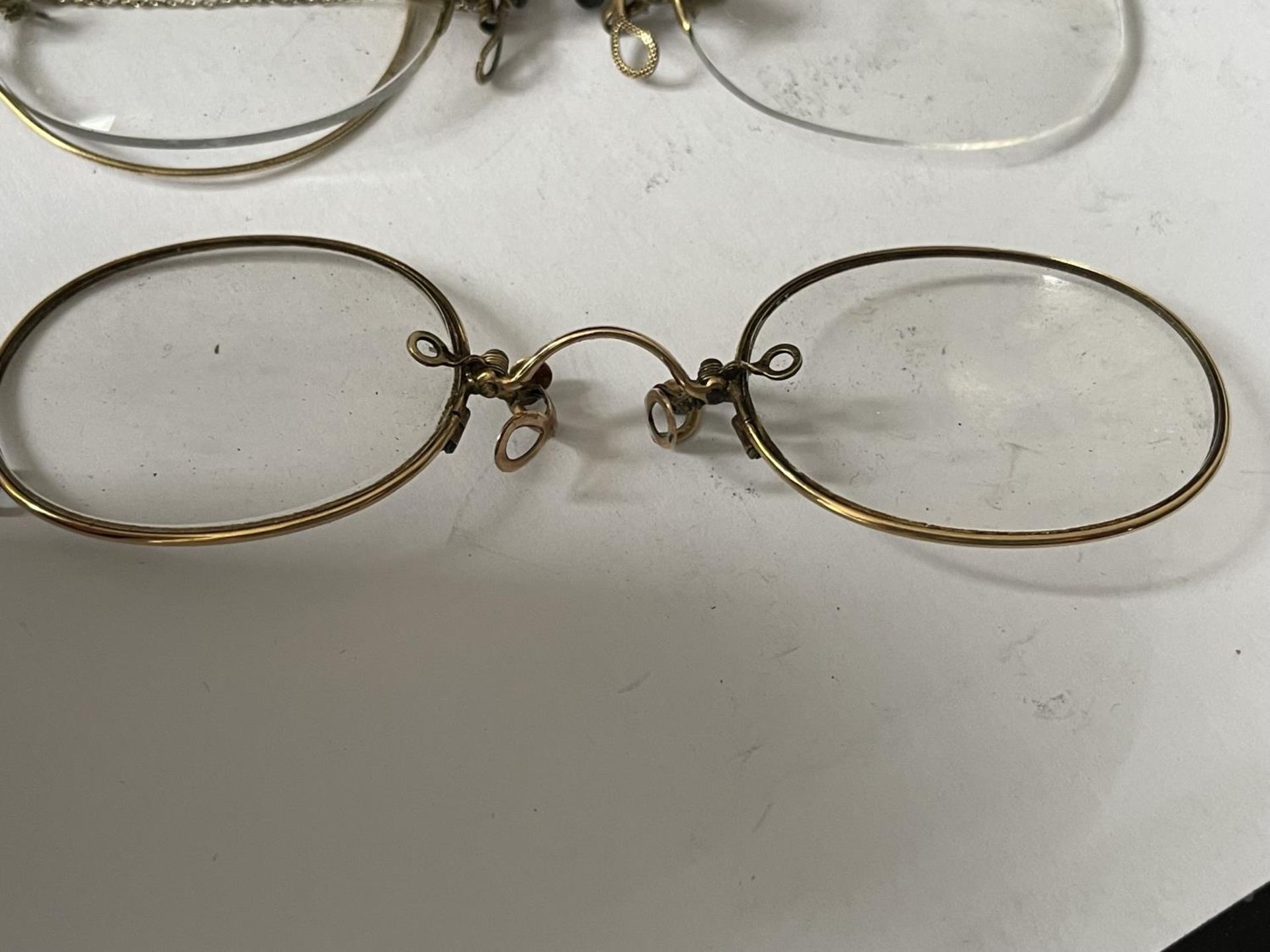 TWO PAIRS OF VINTAGE GOLD PLATED RIM PINCE NEZ IN A CASE - Image 2 of 4