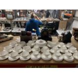 A QUANTITY OF WEDGWOOD CHINA WHITE CUPS, SAUCERS, PLATES, SAUCE BOAT, TUREEN, ETC