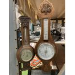 A SMALL OAK CASED BAROMETER DATED 1931 PLUS A LARGER MAHOGANY CASED BAROMETER