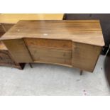 A RETRO TEAK SIDEBOARD BY UNIFLEX ENCLOSING TWO CUPBOARDS AND THREE DRAWERS, ONE WITH CHEVRON INLAY,