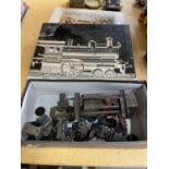 A HARDBACK BOOK ON "A CENTURY OF MODEL TRAINS" BY ALLEN LEVY AND A SCRATCH BUILT PART MODEL OF A