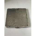 A VINTAGE DECORATIVE COLIBRI SILVER PLATED COMPACT ENGRAVED