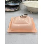 A PINK ART DECO STYLE POSSIBLY BAKELITE BUTTER DISH