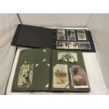 A VINTAGE PHOTO ALBUM CONTAINING FAMILY PHOTOGRAPHS PLUS A VINTAGE POSTCARD ALBUM WITH MAINLY