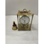 A 'LUNDA' CARRIAGE CLOCK WITH KEY PLUS A MINIATURE BELLS DECANTER