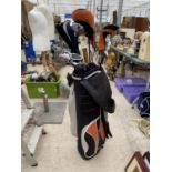 A LONGRIDGE GOLF BAG WITH AN ASSORTMENT OF LONGRIDGE GOLF CLUBS