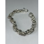 A MARKED SILVER HARLEY DAVIDSON SKULL BRACELET