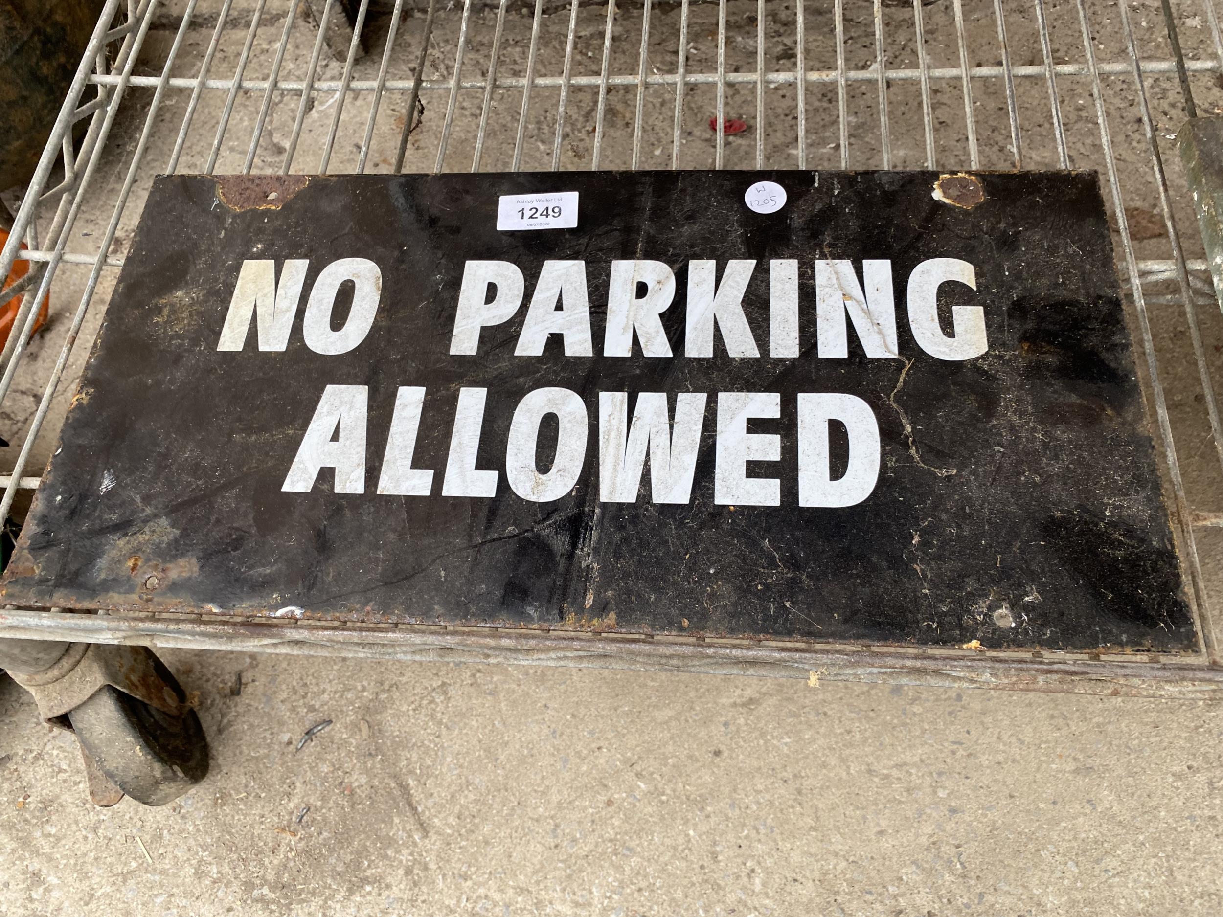 A VINTAGE ENAMEL 'NO PARKING' SIGN