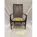AN EARLY 20TH CENTURY LIBERTY BIRMINGHAM BEECH NURSING CHAIR WITH TURNED LEGS AND STRETCHERS,