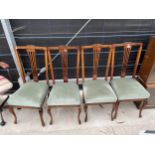 A SET OF FOUR BEECH PARLOUR CHAIRS ON FRONT CABRIOLE LEGS