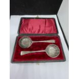 A BOXED SET OF TWO SILVER PLATED SPOONS