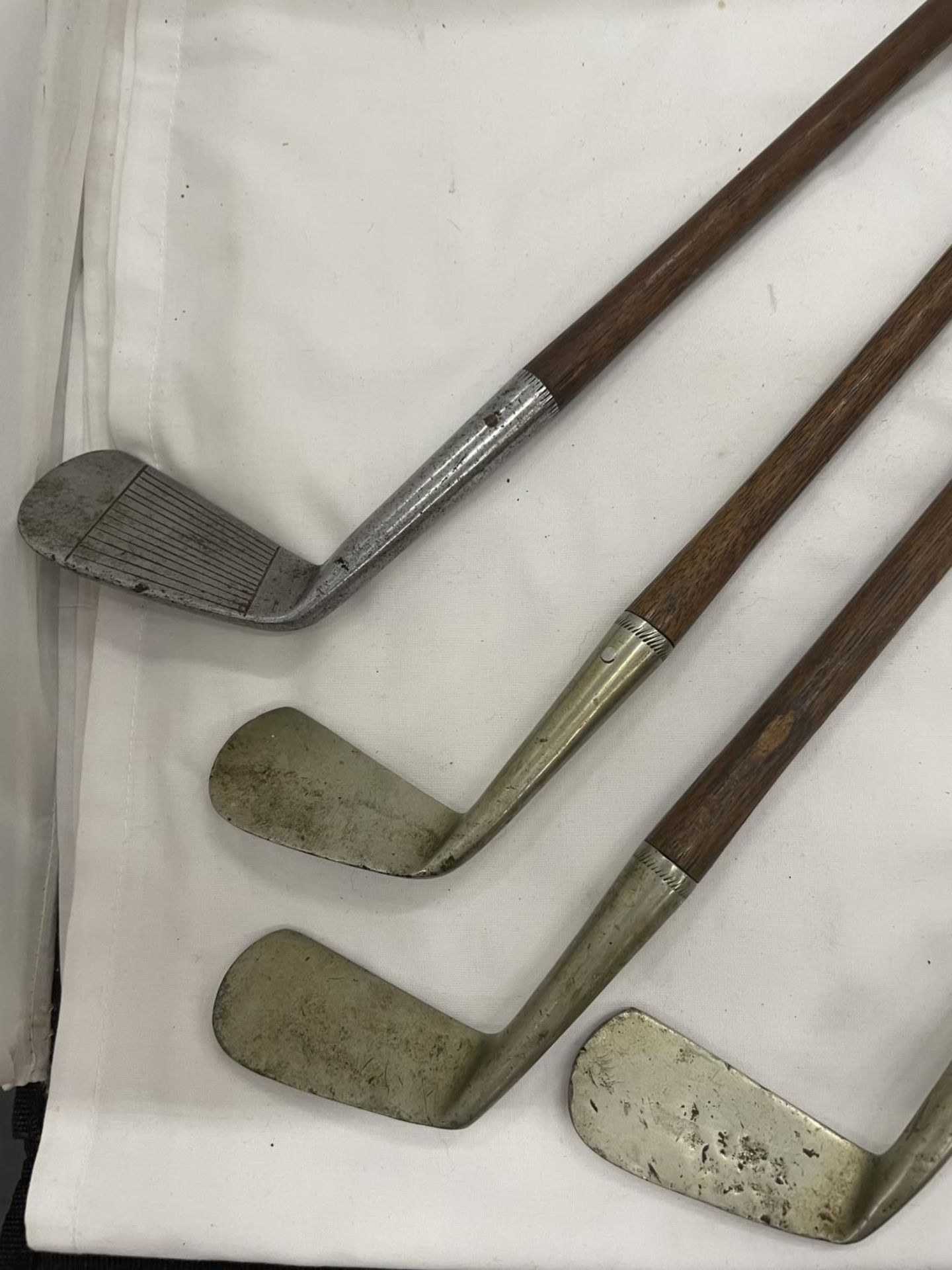 FOUR VINTAGE GOLF CLUBS WITH HICKORY SHAFTS, THREE 'SHELL' AND ONE 'THORNTONS' - Image 2 of 2