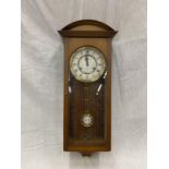 A MAHOGANY CASED WALL CLOCK