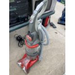 A VAX DUAL V CARPET CLEANER BELIEVED IN WORKING ORDER BUT NO WARRANTY