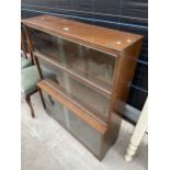 A MID 20TH CENTURY THREE TIER STACKING MINTY BOOKCASE, 35" WIDE