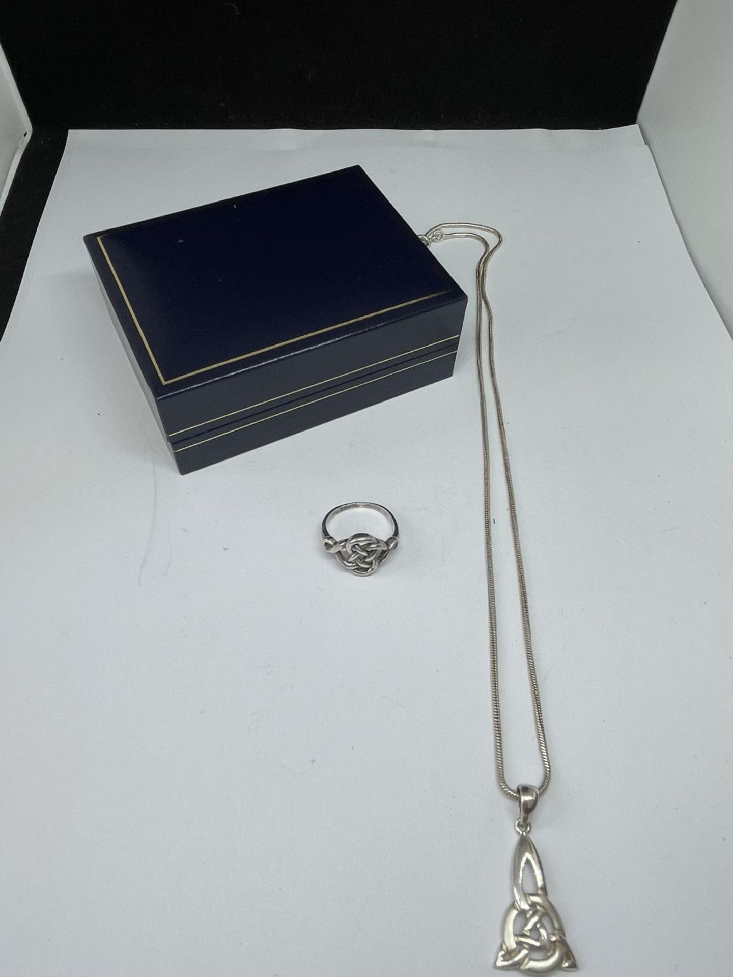 A MARKED SILVER MACKINTOSCH NECKLACE WITH PENDANT AND A RING