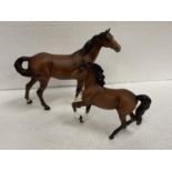 TWO BESWICK HORSES TO INCLUDE A MATT PRANCING BAY AND A MATT STANDING BAY