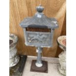 A VINTAGE CAST ALLOY POST BOX WITH CAST IRON BASE (H:114CM)