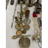 A QUANTITY OF BRASSWARE TO INCLUDE CANDLESTICKS, PIN DISHES, SMALL VASES, ETC