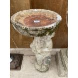 A RECONSTITUTED STONE BIRD BATH WITH CHERUB PEDESTAL BASE (H:71CM)