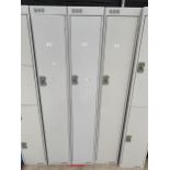 A METAL LOCKER CABINET WITH KEY