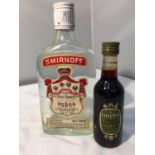 A RARE BOTTLE OF SMIRNOFF 13 1/3 FL OZS AND 65.5 % PROOF PRODUCED IN ENGLAND TOGETHER WITH A 10CL