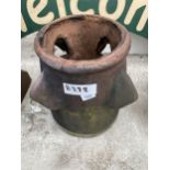 A TERRACOTTA CHIMNEY POT