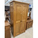 A MODERN PINE TWO DOOR WARDROBE, 37" WIDE