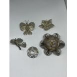 FIVE DECORATIVE SILVER BROOCHES