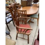 A WINDSOR STYLE ELBOW CHAIR WITH SPINDLE BACK