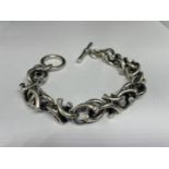 A HEAVY SILVER T BAR BRACELET